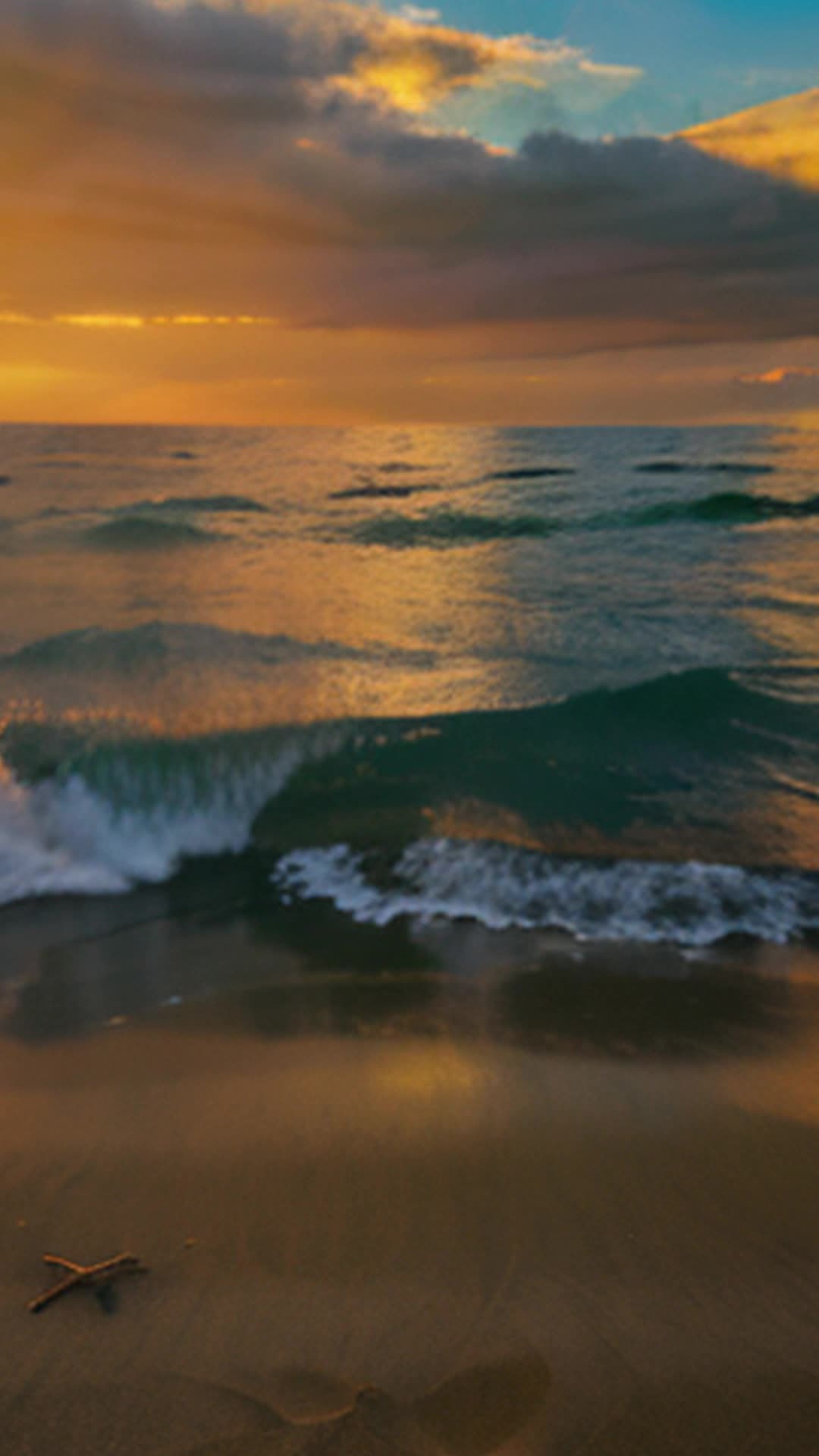 Dynamic sunset sky, colors shifting dramatically, wide angle, serene beach setting with gentle waves lapping at the shore