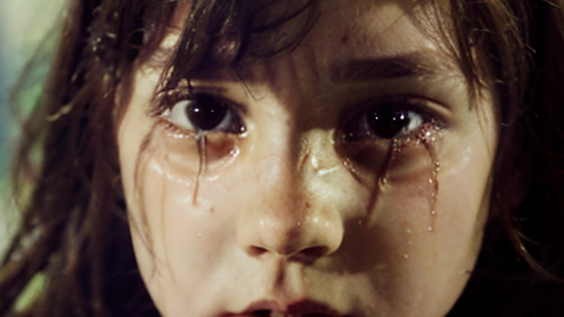 crying little brunette girl