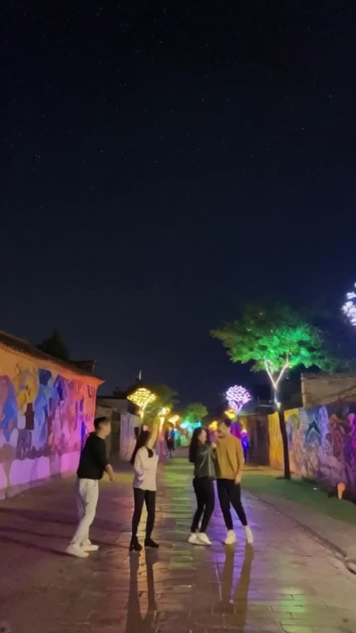 A group of lively friends bursting with energy vibrant faces glowing with excitement leaping into action embarking on spirited adventures diving into a treasure trove of memories reconnecting with their roots. Colorful murals painting town walls transforming sleepy streets into a lively feast of shared stories sounds of laughter echoing through bustling cafes trees adorned with glowing lanterns under a starlit sky inviting townsfolk to join in the celebration