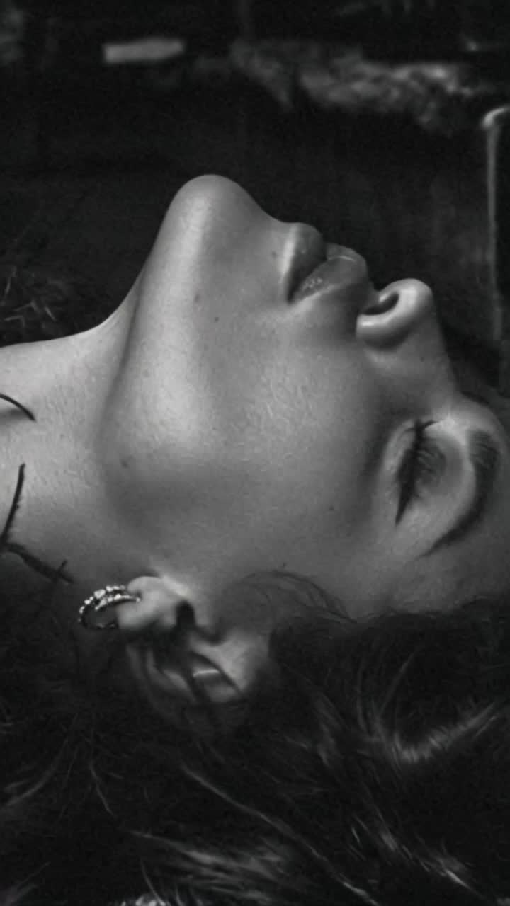 Gorgeous women allow8ng herself to Kay back into a swamp and drown as dark sqamp water and mud cover her, she is out in the swamp and wilderness drowning alone