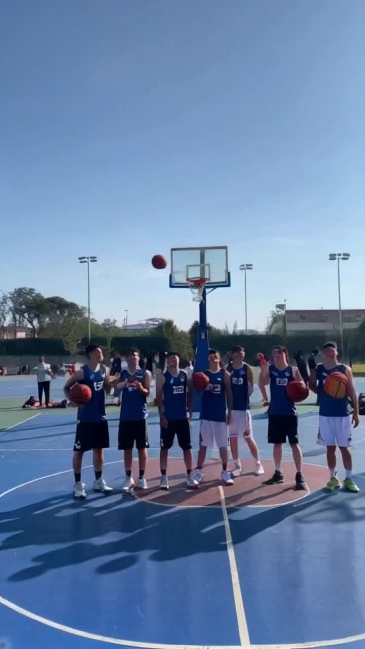 Eager basketball team united in vibrant jerseys soaring with excitement after each victorious basket radiating joy and determination laced in their smiles shouting and high-fiving each other with infectious energy as adrenaline surges  Bustling outdoor court under a sun-drenched sky surrounded by cheering friends towering trees swaying in the gentle breeze banners fluttering showcasing hard-earned victories echoing memories of intense training and unwavering commitment creating an electric atmosphere of unity and ambition