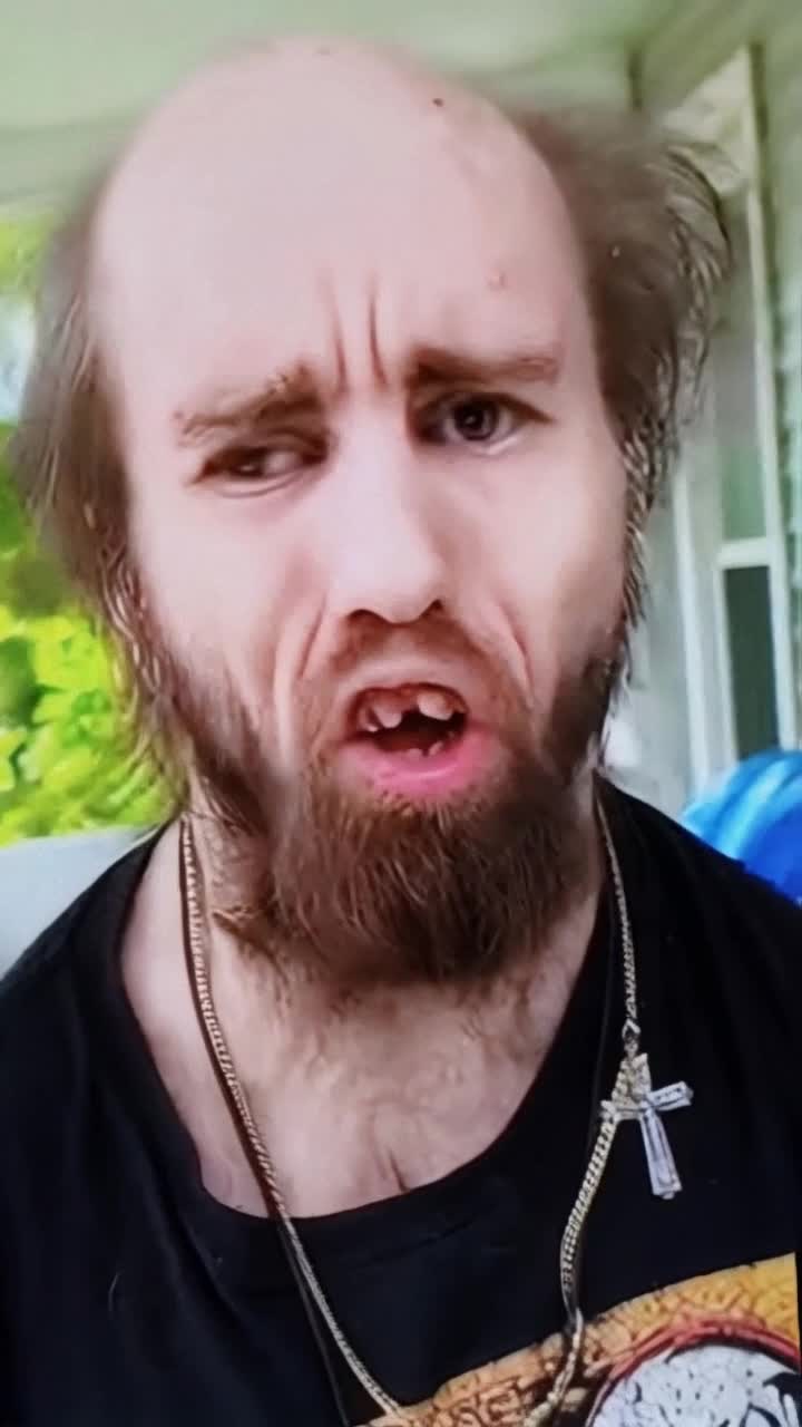 Skinny sickly goblin looking guy dressed in Disheveled  attire yelling insults from the porch,