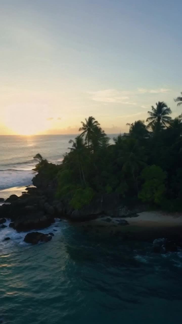 Solitary tropical island glistening under golden hues of dawn vibrant palm trees swaying gently in warm ocean breeze soft waves lapping at pristine shores inviting wildlife stirring from slumber Rays of sunlight pierce through morning mist illuminating rugged cliffs and colorful flora casting playful shadows Tranquil atmosphere infused with a sense of hope as daybreak unveils hidden beauty tranquil sounds of nature harmonizing in a heartfelt serenade capturing raw emotion of new beginnings enchanting visual symphony unfolding before the eyes