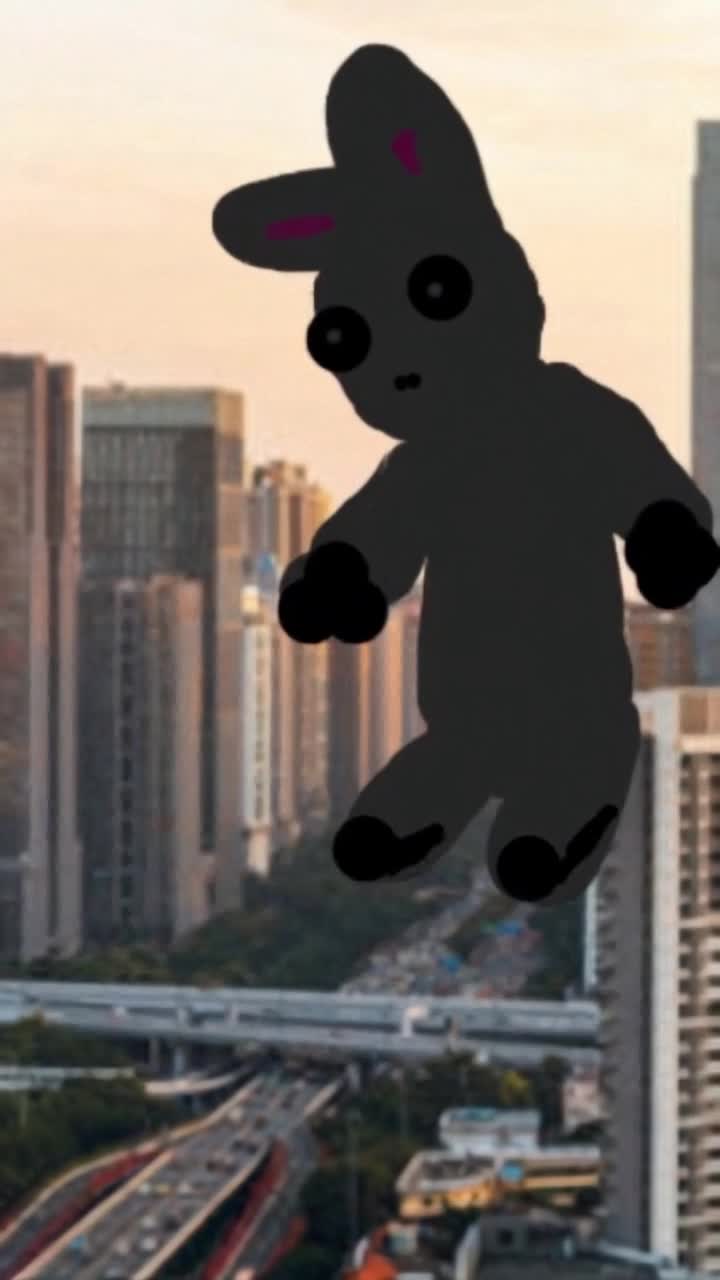 Like a plushie would, he knocks over empty buildings as Godzilla, stomping down the empty city streets, people all fled the dark menace