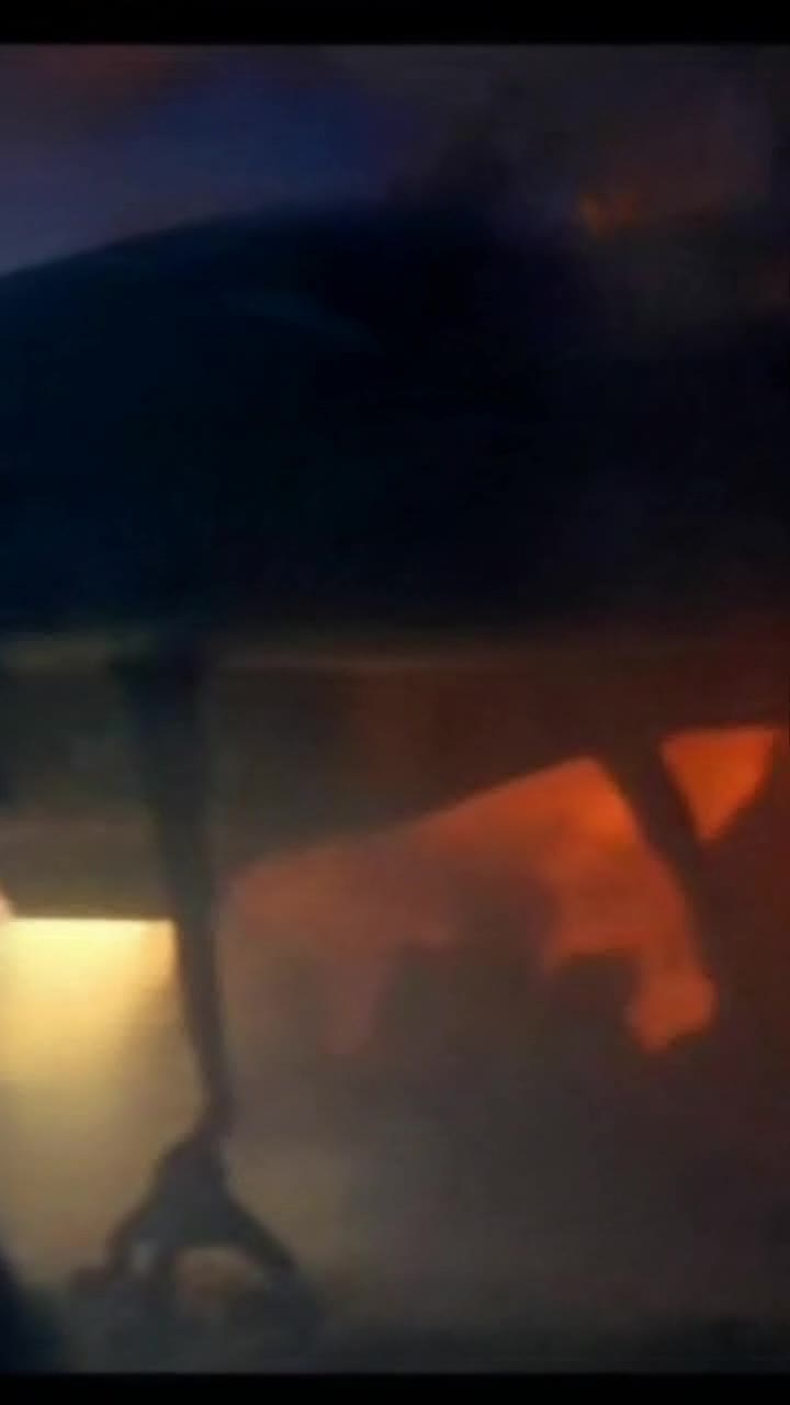 Space lands on a alien planet inside the space ship a female crew member looks out the screen to see the dark planet 