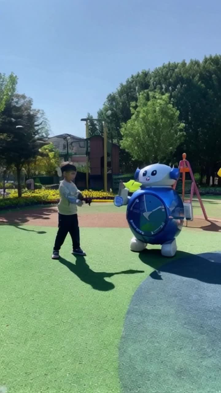 Nobita with messy hair wearing round glasses holding a toy sword Doraemon with round blue body and futuristic gadgets puffing up cheeks squaring off on a vivid playground grassy field surrounded by colorful flowers and tall vibrant trees with a bright sun shining down casting playful shadows on their faces battle erupting as they circle each other preparing to unleash whimsical gadgetry amidst laughter and cheers from nearby animated friends perched on swings and slides adding excitement in the air