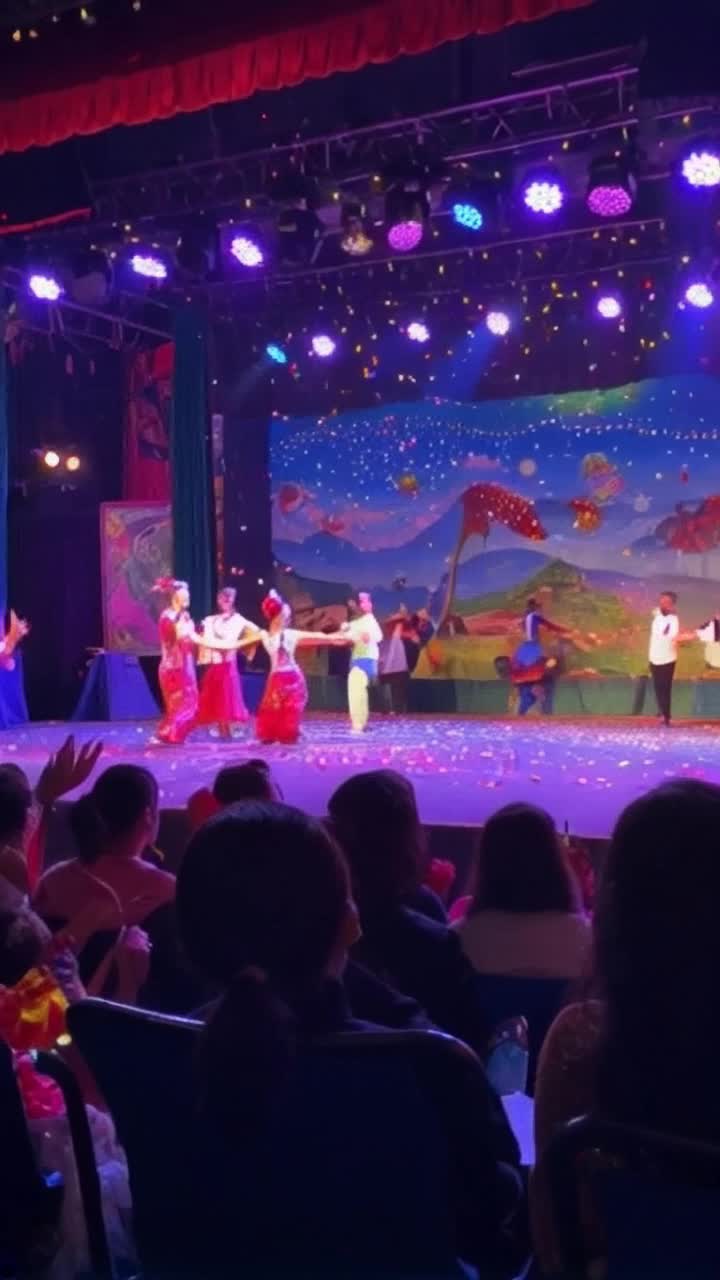 Colorful figures in traditional dance costumes swirl effortlessly across the vibrant stage  Bodies twist and turn in rhythmic harmony  Lively mariachis strum guitars under a tapestry of twinkling lights  Shadows flicker against painted murals depicting festive scenes  Hearts beat to the pulsating tempo of joyous music  Energetic feet stomp and slide in perfect unison  Spectators cheer and clap in delight enveloped in an atmosphere of celebration  Confetti rains down like colorful snow adding a whimsical touch to the electrifying performance  Faces filled with passion shine like stars in a captivating night sky