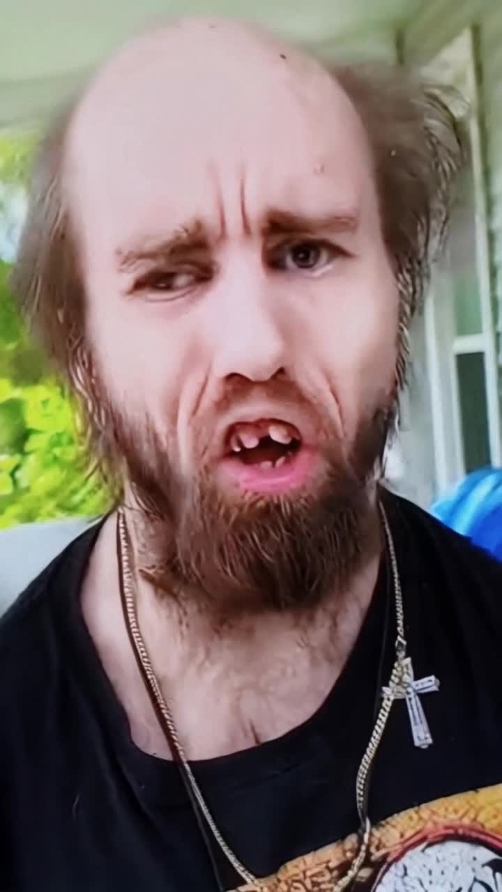Skinny sickly goblin looking guy dressed in shabby attire yelling insults from the porch,