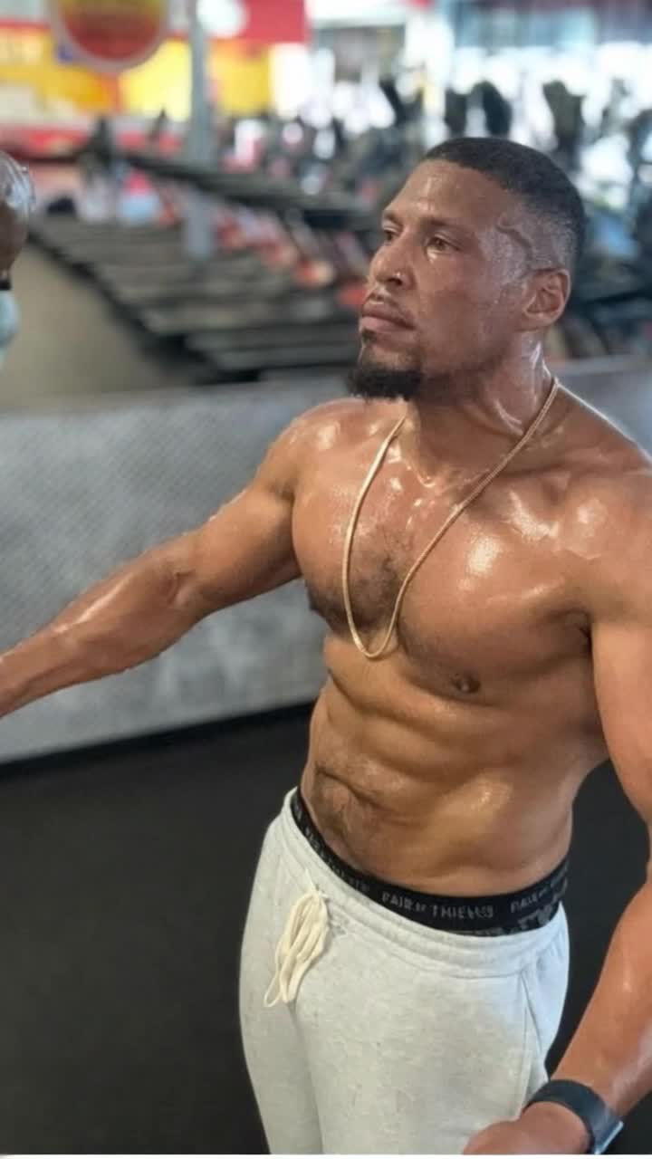 Man picks up a car and lift it over his head