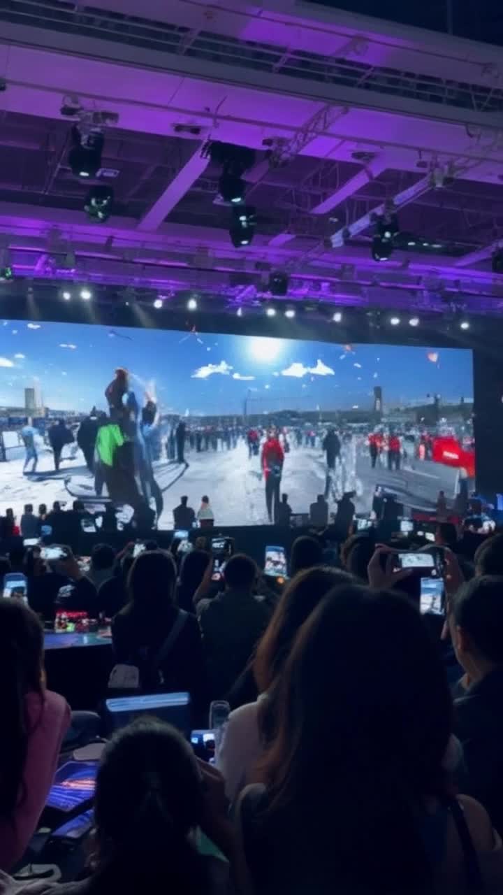 Vibrant holograms swirling in electric colors depicting fierce protest scenes radiating from Lina's determined figure unleashing passionate rebellion against oppressive forces. Spectacular visuals of protesters clashing with drones erupting in dynamic motion against a backdrop of a bustling futuristic tech summit filled with captivated onlookers and towering screens pulsating with energy. Sounds of urgency and defiance resonate throughout the venue as diverse crowds engage in spirited discussions ignited by compelling imagery of resistance inspiring change