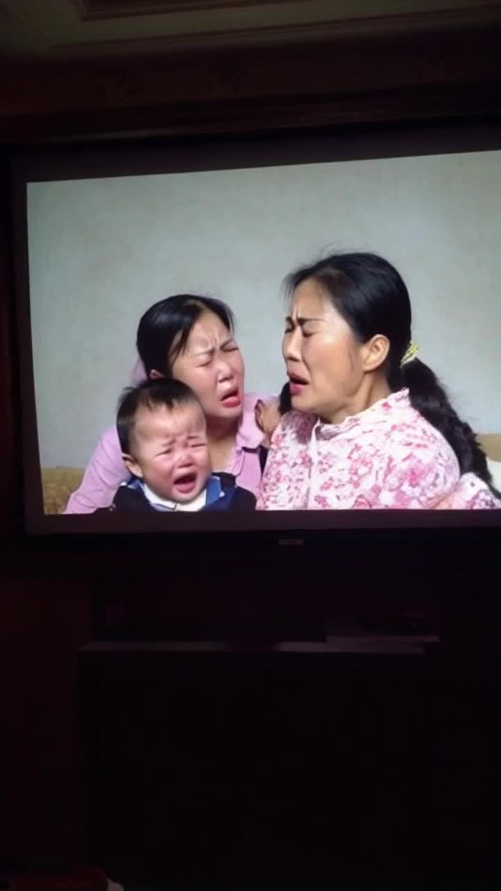 A screen that kids crying and their parents fighting a grandma 
