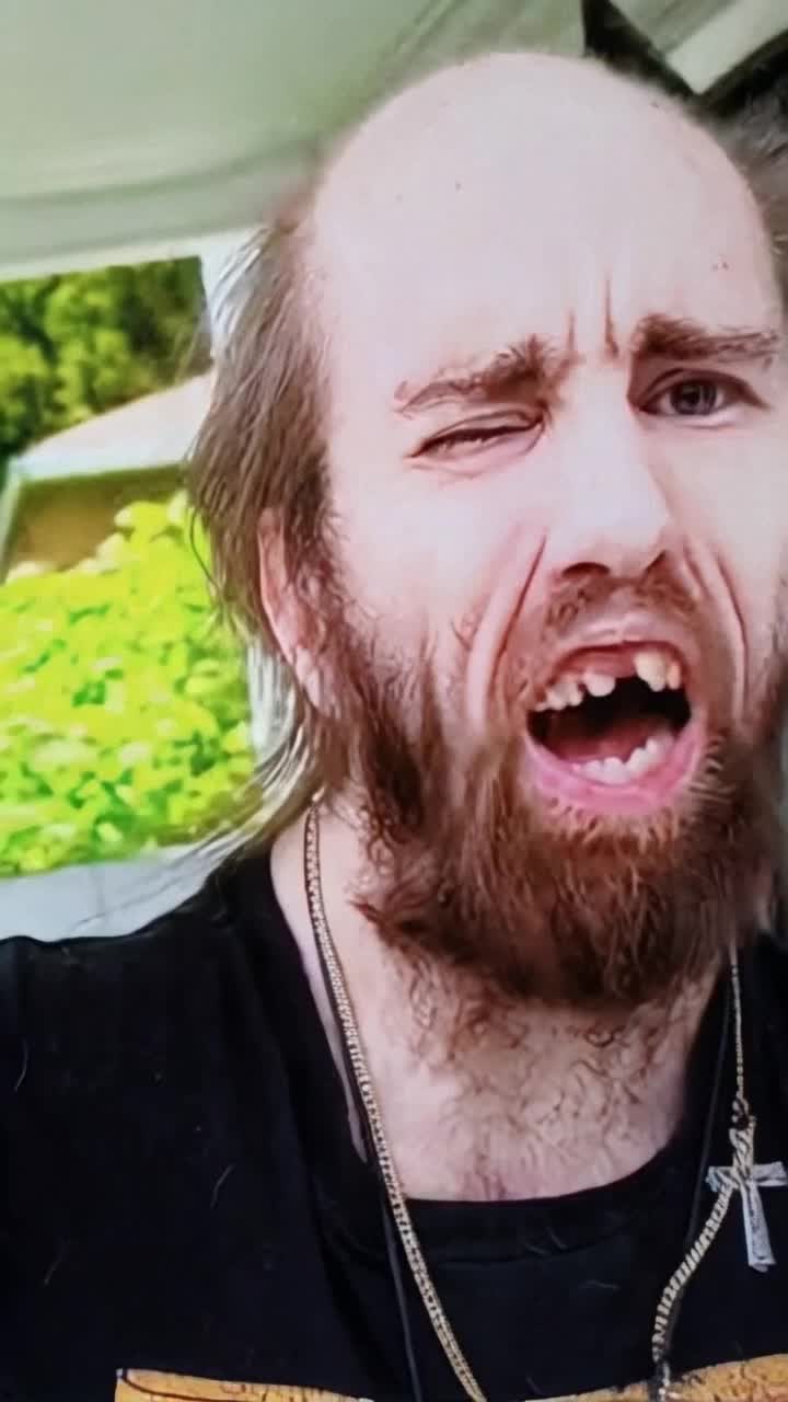 Cyraxx the Akron goblin of Ohio yelling insults from the porch, 