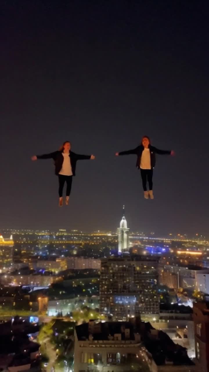 Identical twins with shimmering auburn hair wearing matching dark jackets soar gracefully into the air propelled by sheer energy their eyes sparkling with mischief and adventure reaching for the sky as they vault over the towering silhouettes of rooftops under a starry night their laughter echoing in the cool breeze enveloped by a shimmering cityscape sparkling lights below casting an enchanting glow as shadows dance around them freedom courses through their veins defying gravity with every leap