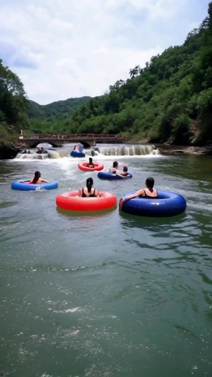 Teenagers floating down lazy river using truck innertubes for floatation,  party, summertime,  sunshine girls in bikinis 