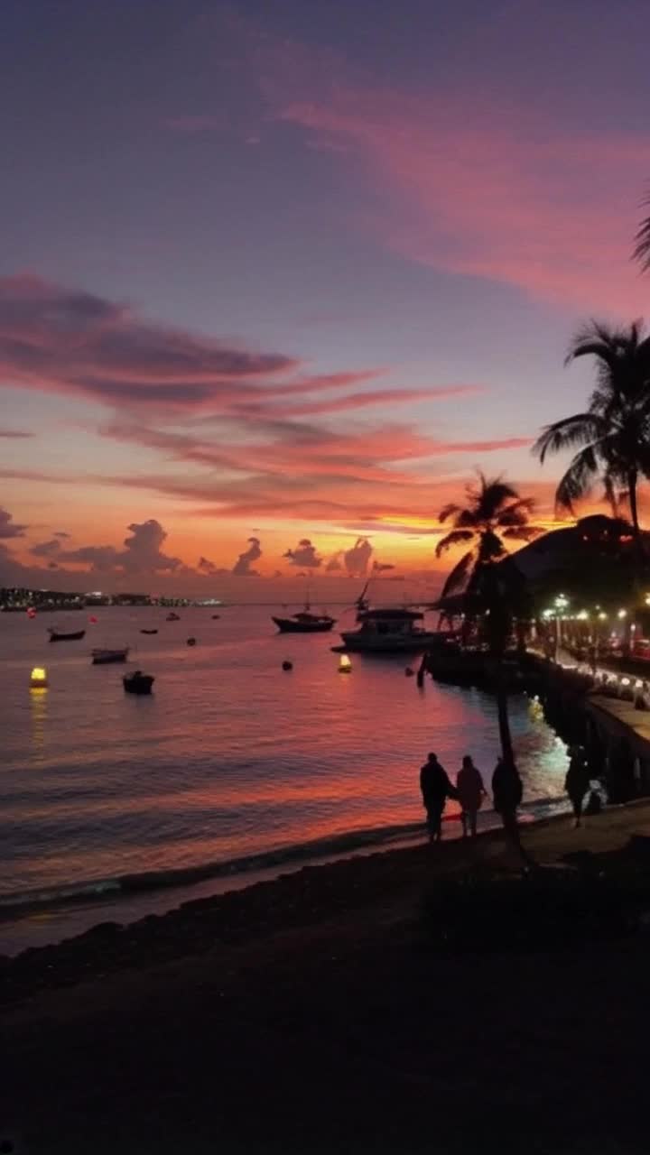 Vibrant sunset hues paint Manila Bay skyline silhouettes of gently rocking boats shimmering water sparkles illuminated lanterns fill the air with warmth couples strolling hand in hand share soft whispers laughter dances in evening breeze as festive lights twinkle above radiating joy tropical palm trees sway gracefully under the velvety twilight sky adding romance to serene atmosphere soft waves lap at shore creating a soothing soundtrack to this enchanting night scene