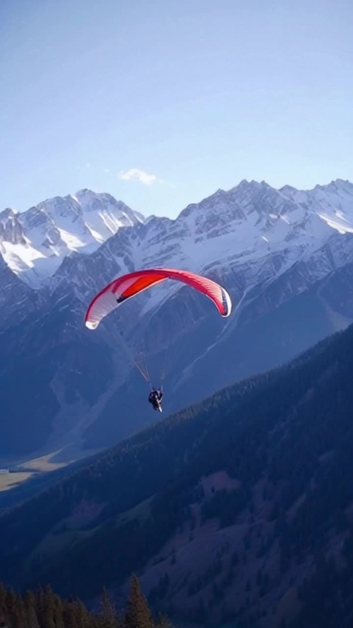 Third person view of a stunning woman paragliding down the slope of a rocky mountain closely following the approaching terrain and navigating just enough to avoid any collisions