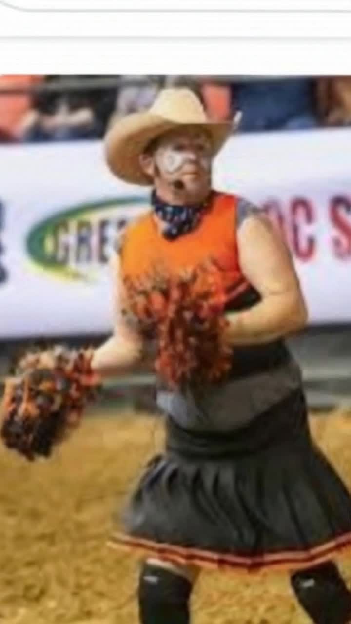 Vibrant rodeo clown dressed in colorful oversized attire bounces energetically, shaking bright pompons with infectious enthusiasm Charming smiles and laughter spread among a captivated audience at a lively rodeo arena Dusty ground kicked up as excited spectators cheer in a sea of cowboy hats and denim jackets under a vibrant sunset sky Embers of excitement glow in the air as lively country music plays in the background enhancing the festive atmosphere