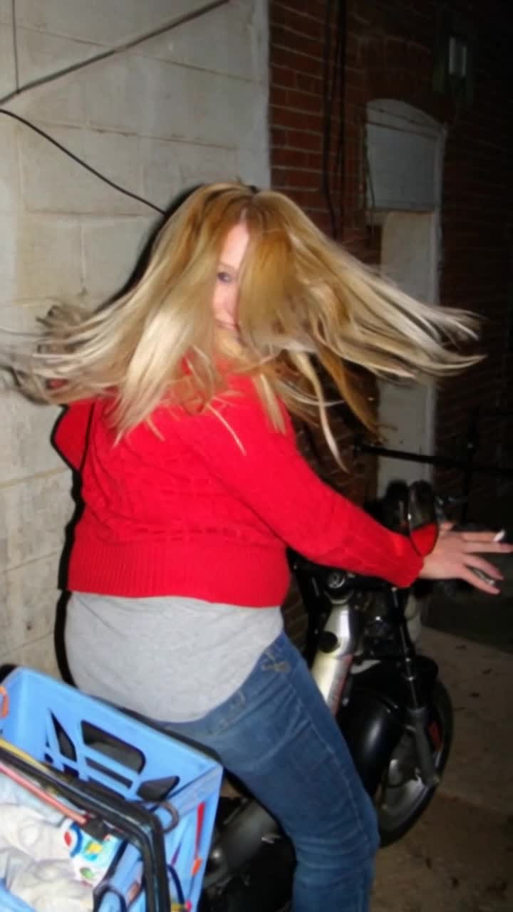 make her and her hair move in slow motion